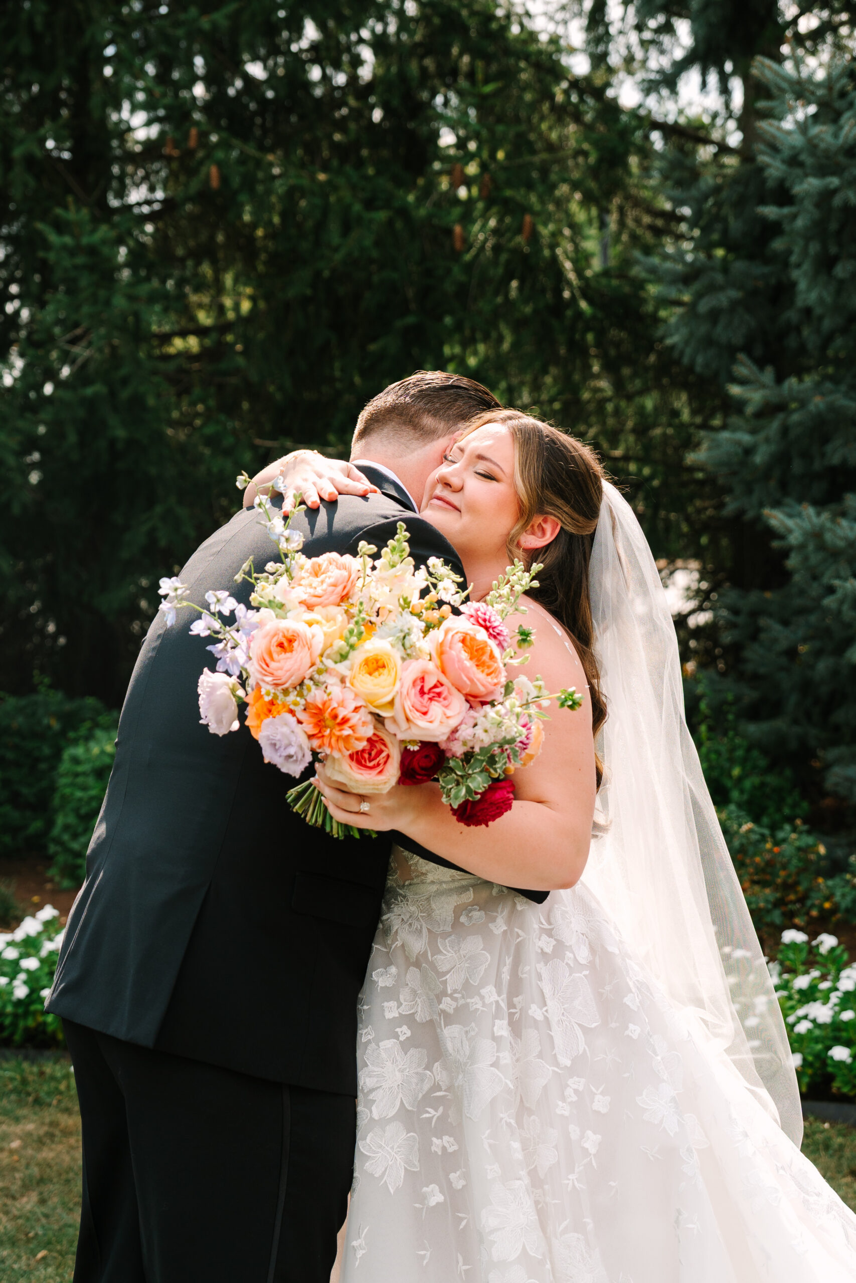 Bride and groom portraits at Ritz Charles wedding in Indianapolis Indiana with colorful florals