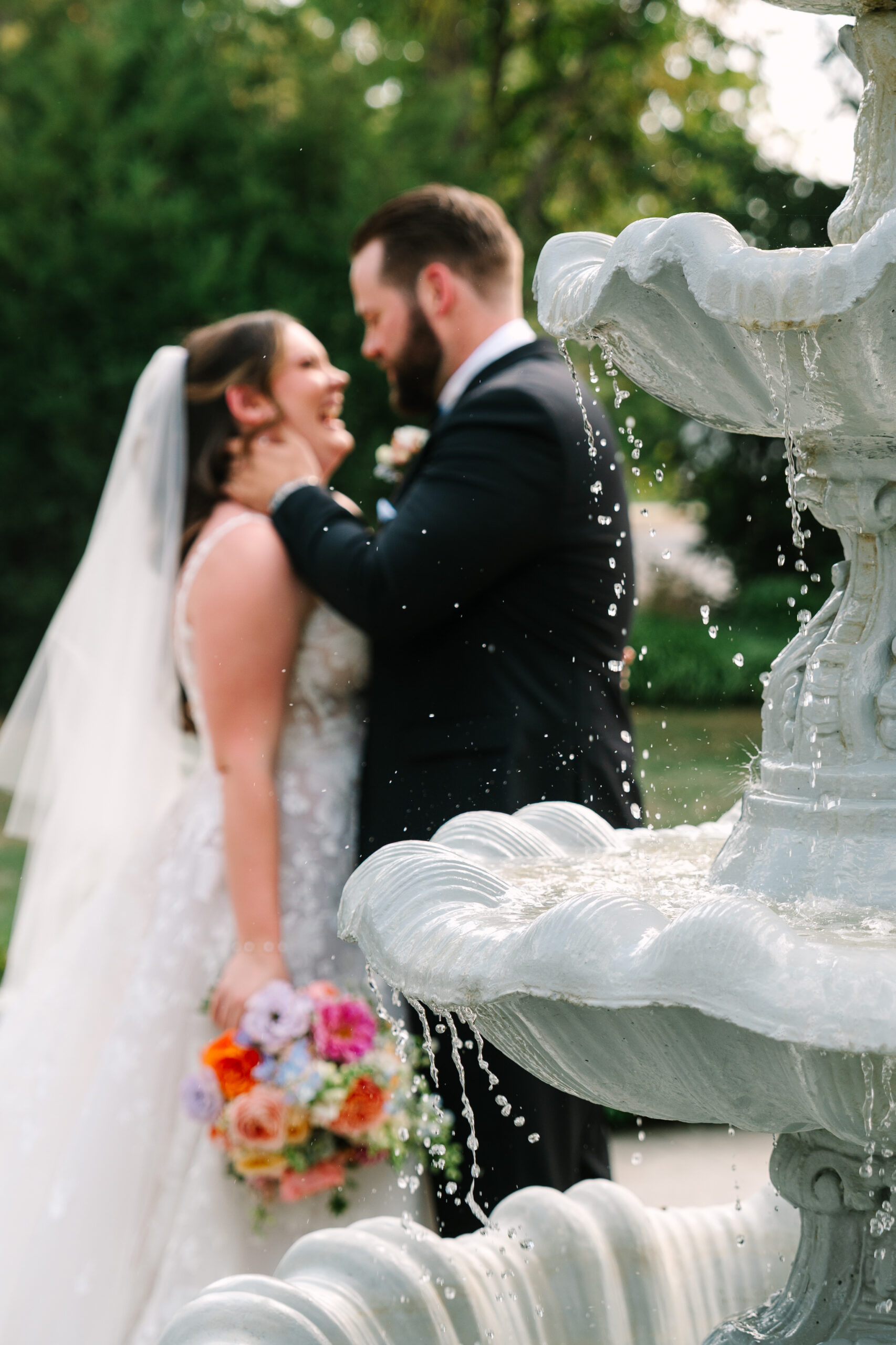 Colorful bridal bouquet with pink and orange flowers