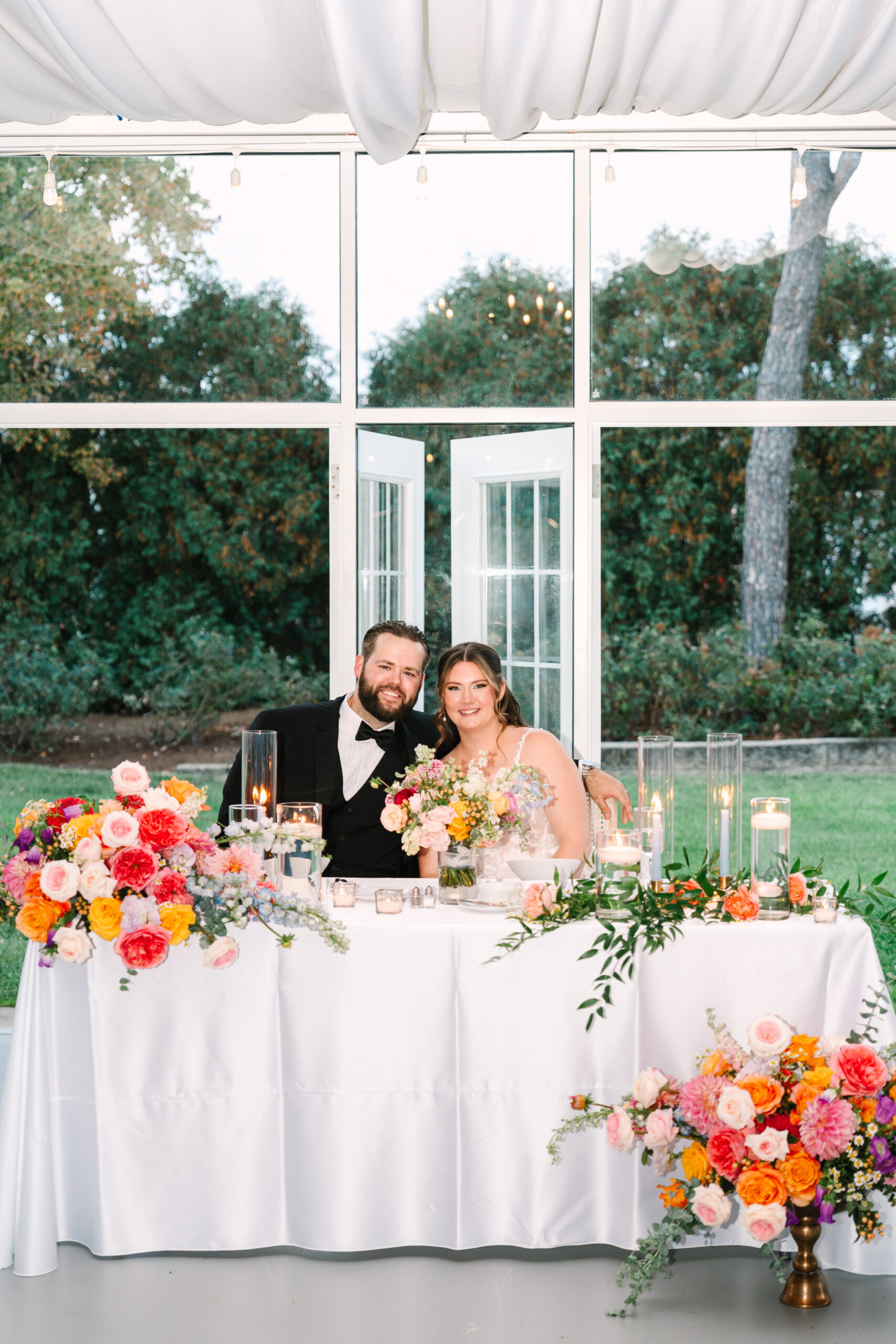 Bride and groom portraits at Ritz Charles wedding in Indianapolis Indiana with colorful florals